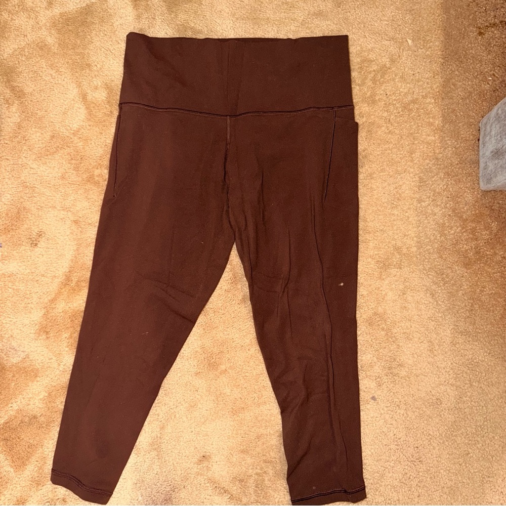 ATHLETA SALUTATION STASH 7/8 leggings with‎ pockets in brown